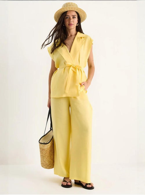 Set con gilet e pantaloni a gamba ampia lucci - Kiabi Set con gilet e pantaloni a gamba ampia lucci - Kiabi