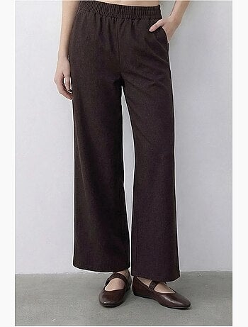 Set con gilet scollo a v con cintura e pantaloni a gamba ampia lucci