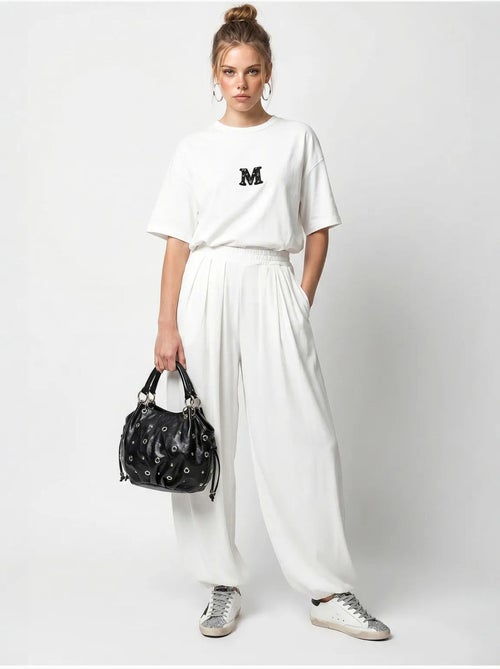 Set con t-shirt oversize a girocollo e pantaloni a gamba ampia lucci - Kiabi Set con t-shirt oversize a girocollo e pantaloni a gamba ampia lucci - Kiabi