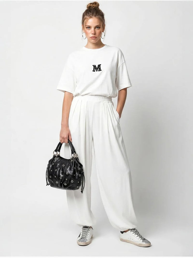 Set con t-shirt oversize a girocollo e pantaloni a gamba ampia lucci Bianco - Kiabi