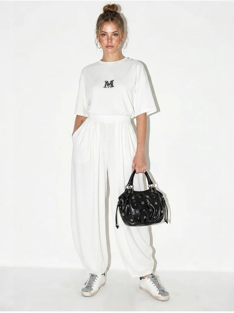 Set con t-shirt oversize a girocollo e pantaloni a gamba ampia lucci Bianco - Kiabi