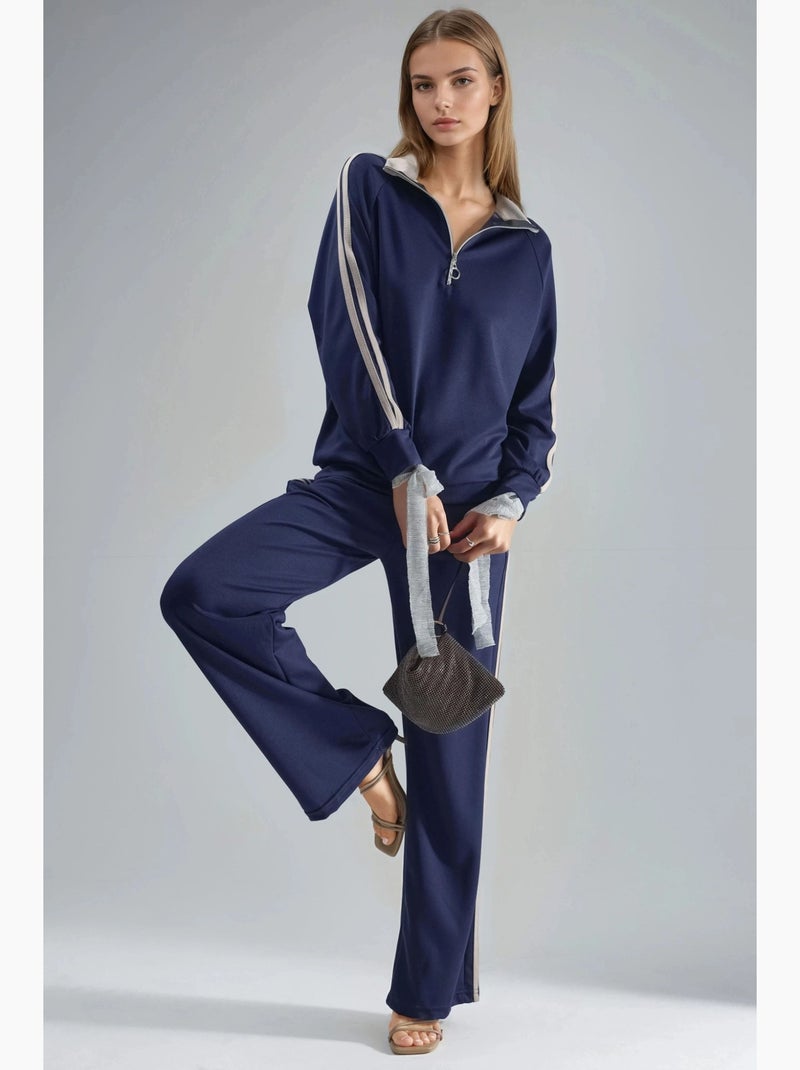 Set coordinato a due pezzi a righe con pantaloni a gamba ampia e colletto con zip hiccup Blu marino - Kiabi