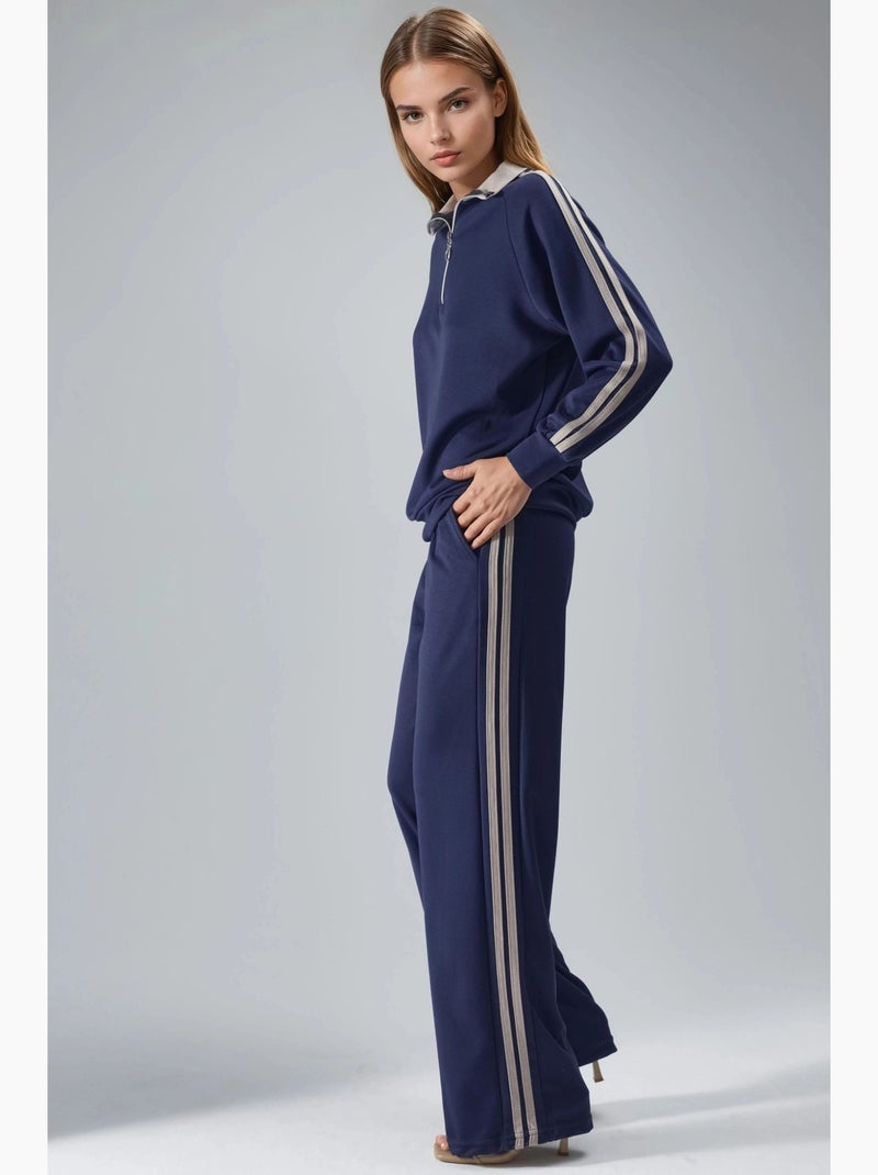 Set coordinato a due pezzi a righe con pantaloni a gamba ampia e colletto con zip hiccup Blu marino - Kiabi