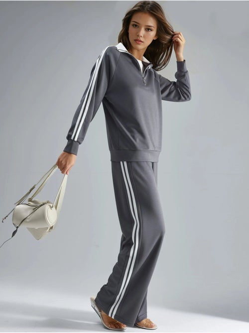 Set coordinato a due pezzi a righe con pantaloni a gamba ampia e colletto con zip hiccup - Kiabi Set coordinato a due pezzi a righe con pantaloni a gamba ampia e colletto con zip hiccup - Kiabi