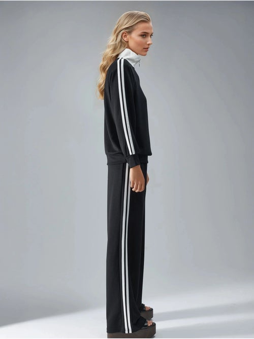 Set coordinato a due pezzi a righe con pantaloni a gamba ampia e colletto con zip hiccup - Kiabi Set coordinato a due pezzi a righe con pantaloni a gamba ampia e colletto con zip hiccup - Kiabi