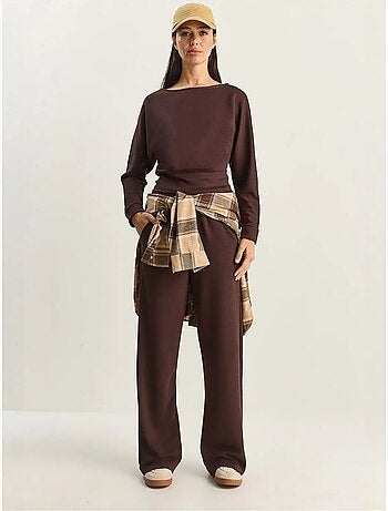 Set coordinato a due pezzi in maglia con colletto asimmetrico e vita alta lucci