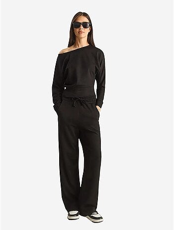 Set coordinato a due pezzi in maglia con colletto asimmetrico e vita alta lucci