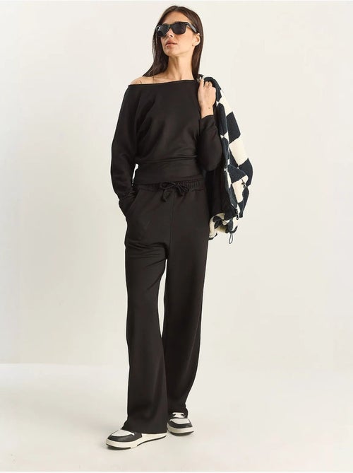 Set coordinato a due pezzi in maglia con colletto asimmetrico e vita alta lucci - Kiabi Set coordinato a due pezzi in maglia con colletto asimmetrico e vita alta lucci - Kiabi