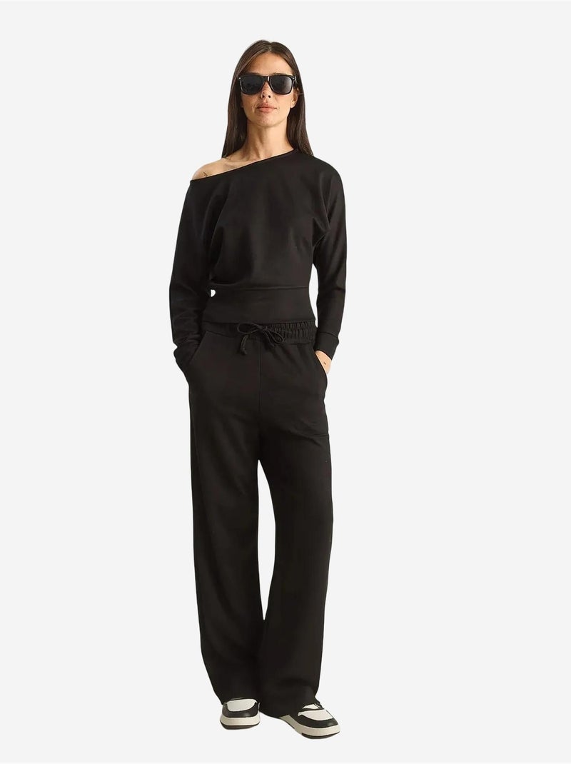 Set coordinato a due pezzi in maglia con colletto asimmetrico e vita alta lucci Nero - Kiabi
