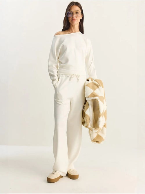 Set coordinato a due pezzi in maglia con colletto asimmetrico e vita alta lucci - Kiabi Set coordinato a due pezzi in maglia con colletto asimmetrico e vita alta lucci - Kiabi