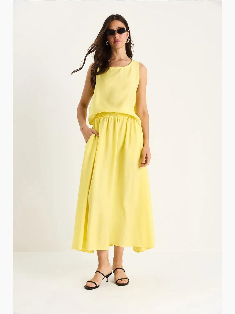 Set coordinato con top senza maniche a scollo rotondo e gonna midi lucci Giallo limone - Kiabi