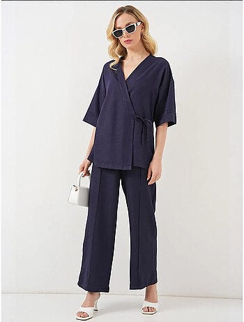 Set coordinato di pantaloni kimono oversize con scollo a v e chiusura con laccetto bdart