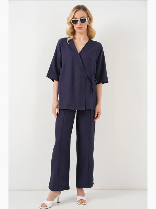 Set coordinato di pantaloni kimono oversize con scollo a v e chiusura con laccetto bdart - Kiabi Set coordinato di pantaloni kimono oversize con scollo a v e chiusura con laccetto bdart - Kiabi