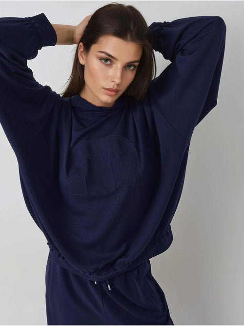 Set coordinato due pezzi con cappuccio, oversize e vita alta hiccup - Kiabi Set coordinato due pezzi con cappuccio, oversize e vita alta hiccup - Kiabi
