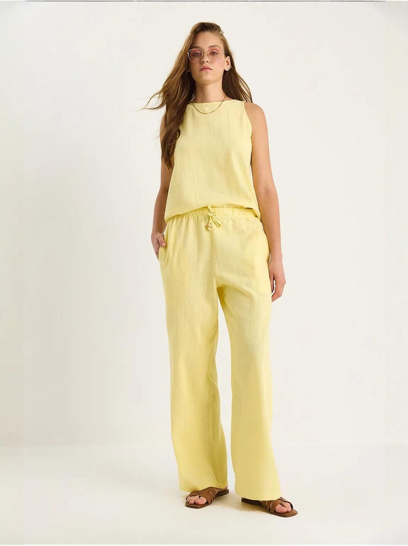 Set coordinato due pezzi in misto lino senza maniche a vita alta lucci Giallo limone - Kiabi
