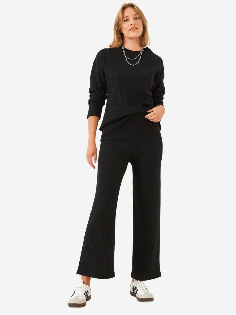 Set coordinato in maglia a costine testurizzata con maglione girocollo e pantaloni lucci Nero - Kiabi