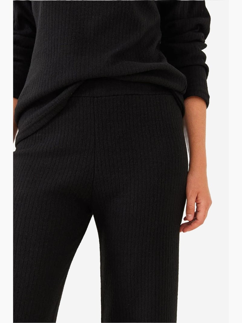 Set coordinato in maglia a costine testurizzata con maglione girocollo e pantaloni lucci Nero - Kiabi