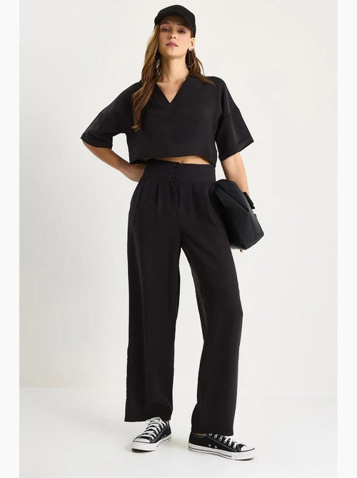 Set coordinato in maglia a due pezzi con scollo a v e pantaloni a gamba ampia lucci - Kiabi