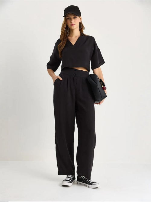 Set coordinato in maglia a due pezzi con scollo a v e pantaloni a gamba ampia lucci - Kiabi