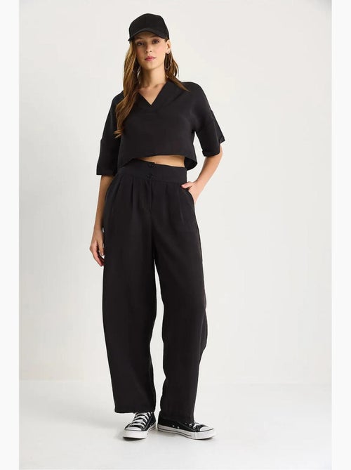 Set coordinato in maglia a due pezzi con scollo a v e pantaloni a gamba ampia lucci - Kiabi