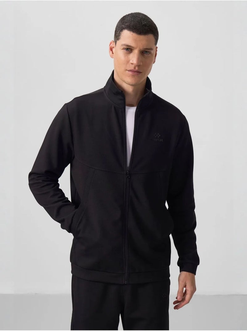 Set da uomo con felpa a maniche lunghe con zip e pantaloni tommy Nero - Kiabi