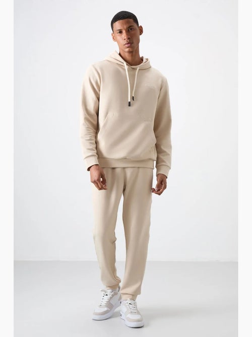 Set da uomo con felpa con cappuccio e pantaloni tommy - Kiabi Set da uomo con felpa con cappuccio e pantaloni tommy - Kiabi