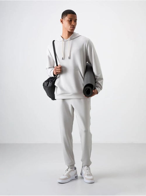 Set da uomo con felpa con cappuccio e pantaloni tommy - Kiabi Set da uomo con felpa con cappuccio e pantaloni tommy - Kiabi