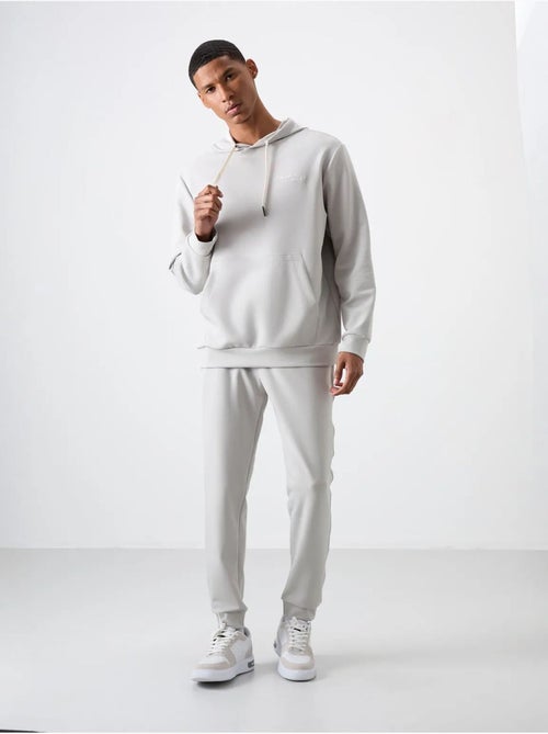 Set da uomo con felpa con cappuccio e pantaloni tommy - Kiabi Set da uomo con felpa con cappuccio e pantaloni tommy - Kiabi