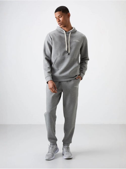 Set da uomo con felpa con cappuccio e pantaloni tommy - Kiabi Set da uomo con felpa con cappuccio e pantaloni tommy - Kiabi