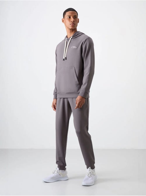Set da uomo con felpa con cappuccio e pantaloni tommy - Kiabi Set da uomo con felpa con cappuccio e pantaloni tommy - Kiabi