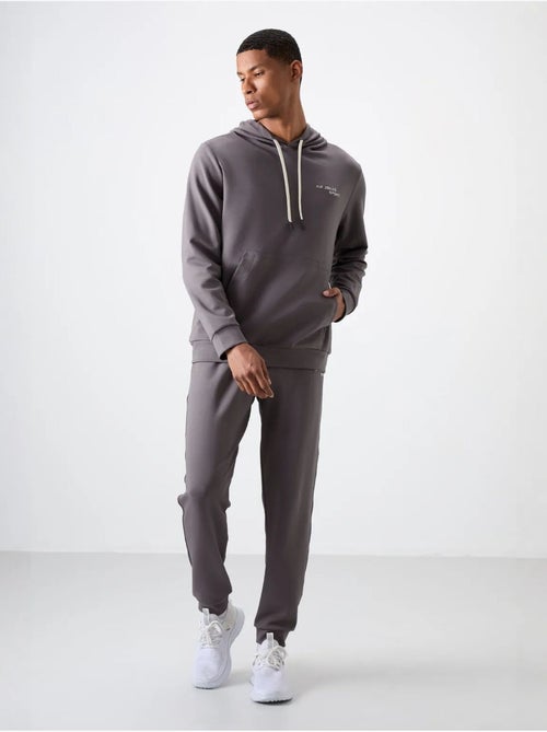 Set da uomo con felpa con cappuccio e pantaloni tommy - Kiabi Set da uomo con felpa con cappuccio e pantaloni tommy - Kiabi