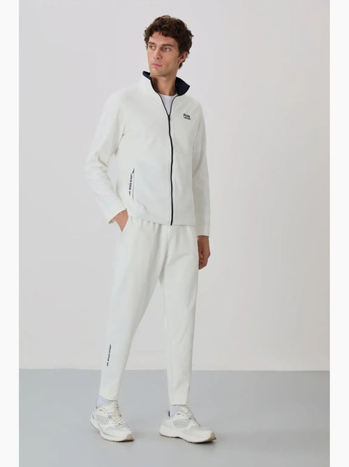 Set da uomo con felpa con collo con zip e pantaloni tommy - Kiabi Set da uomo con felpa con collo con zip e pantaloni tommy - Kiabi