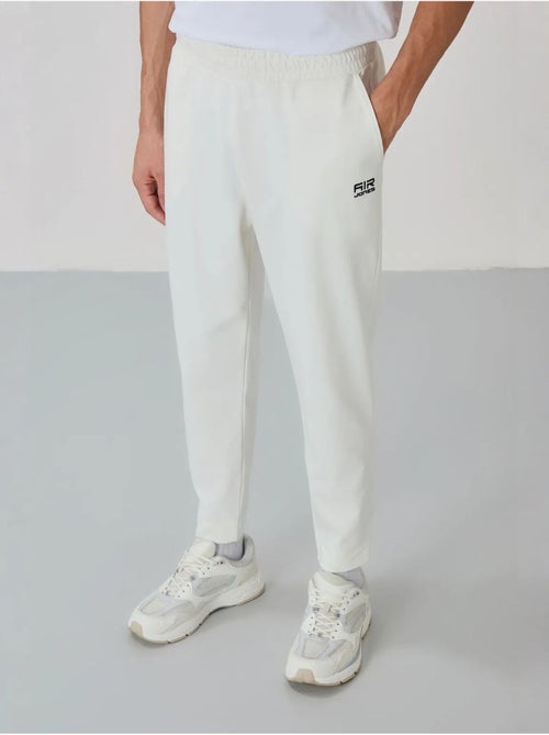 Set da uomo con felpa con collo con zip e pantaloni tommy - Kiabi Set da uomo con felpa con collo con zip e pantaloni tommy - Kiabi