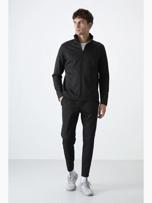 Set da uomo con felpa con collo con zip e pantaloni tommy - Kiabi Set da uomo con felpa con collo con zip e pantaloni tommy - Kiabi