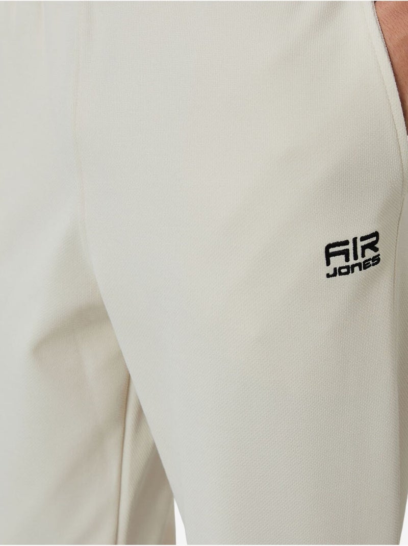 Set da uomo con felpa con collo con zip e pantaloni tommy Sabbia - Kiabi