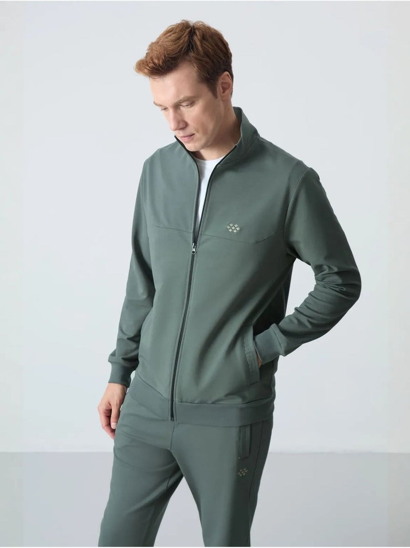 Set da uomo con felpa con collo con zip e pantaloni tommy Verde - Kiabi