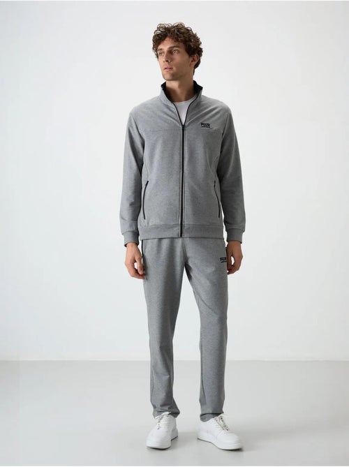 Set da uomo con felpa e pantaloni in pile lavorato a maglia tommy - Kiabi Set da uomo con felpa e pantaloni in pile lavorato a maglia tommy - Kiabi
