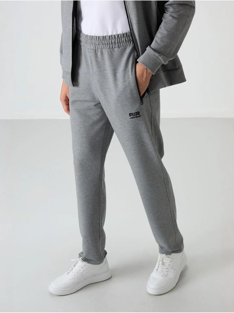 Set da uomo con felpa e pantaloni in pile lavorato a maglia tommy Grigio - Kiabi
