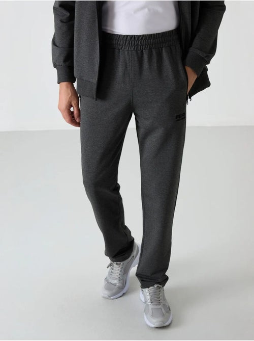 Set da uomo con felpa e pantaloni in pile lavorato a maglia tommy - Kiabi Set da uomo con felpa e pantaloni in pile lavorato a maglia tommy - Kiabi