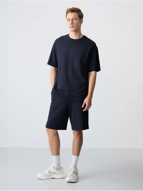 Set da uomo con t-shirt oversize e shorts in misto cotone tommy - Kiabi Set da uomo con t-shirt oversize e shorts in misto cotone tommy - Kiabi