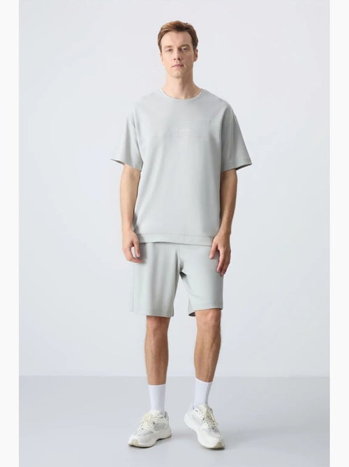 Set da uomo con t-shirt oversize e shorts in misto cotone tommy - Kiabi Set da uomo con t-shirt oversize e shorts in misto cotone tommy - Kiabi
