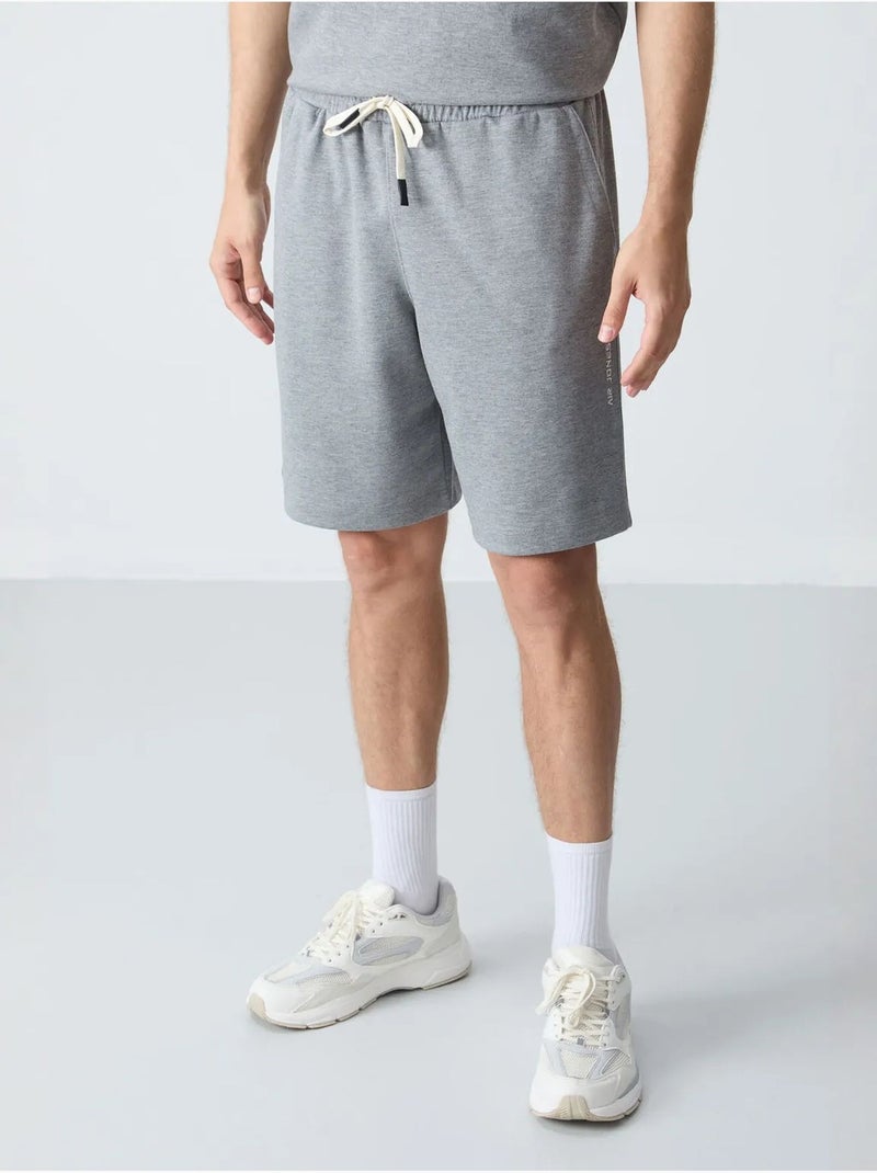 Set da uomo con t-shirt oversize e shorts in misto cotone tommy Grigio - Kiabi