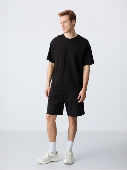 Set da uomo con t-shirt oversize e shorts in misto cotone tommy - Kiabi Set da uomo con t-shirt oversize e shorts in misto cotone tommy - Kiabi