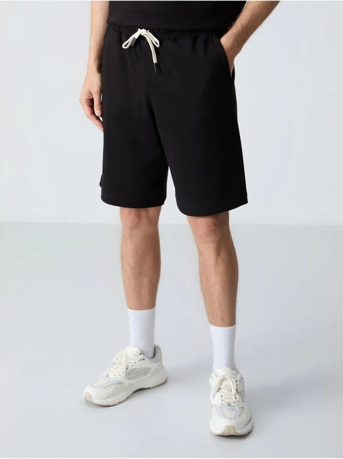 Set da uomo con t-shirt oversize e shorts in misto cotone tommy - Kiabi Set da uomo con t-shirt oversize e shorts in misto cotone tommy - Kiabi