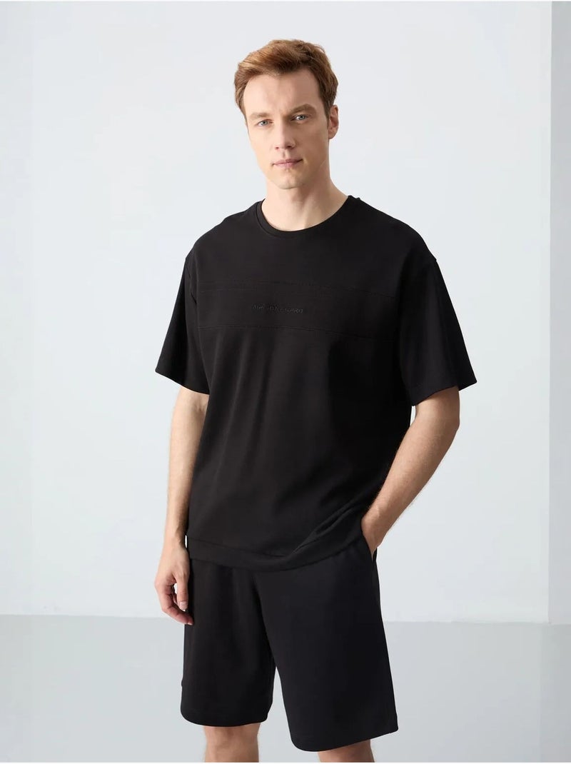 Set da uomo con t-shirt oversize e shorts in misto cotone tommy Nero - Kiabi