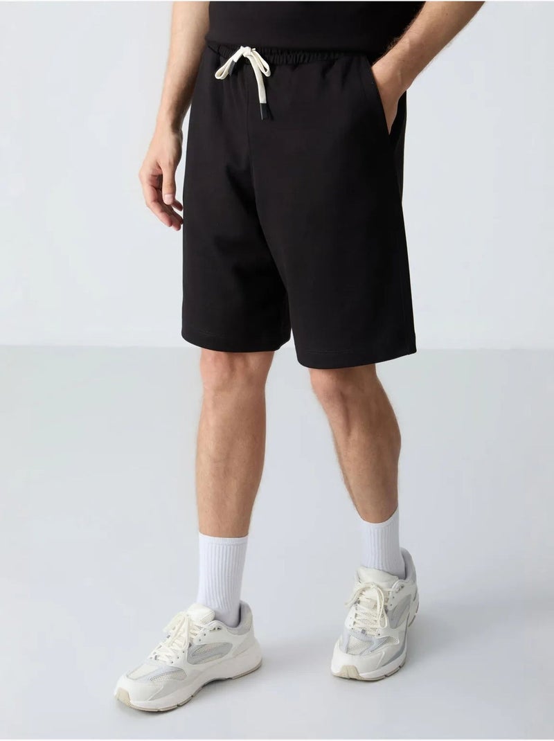 Set da uomo con t-shirt oversize e shorts in misto cotone tommy Nero - Kiabi