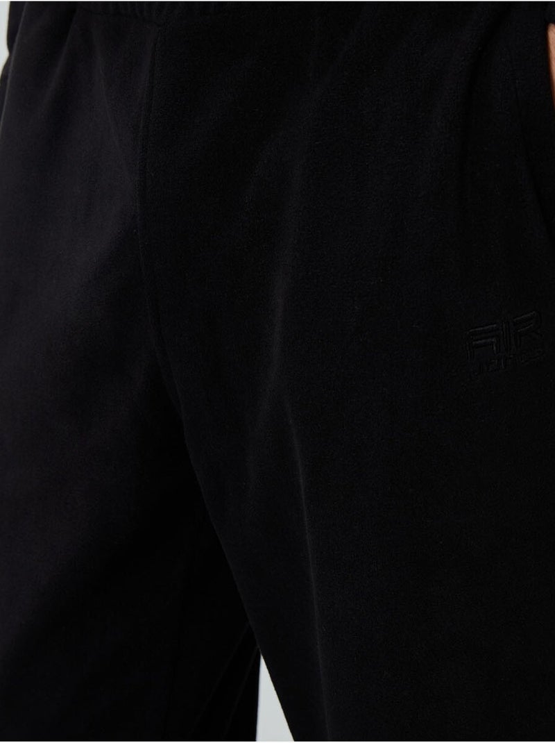 Set da uomo di felpa e pantaloni in pile di poliestere tommy Nero - Kiabi