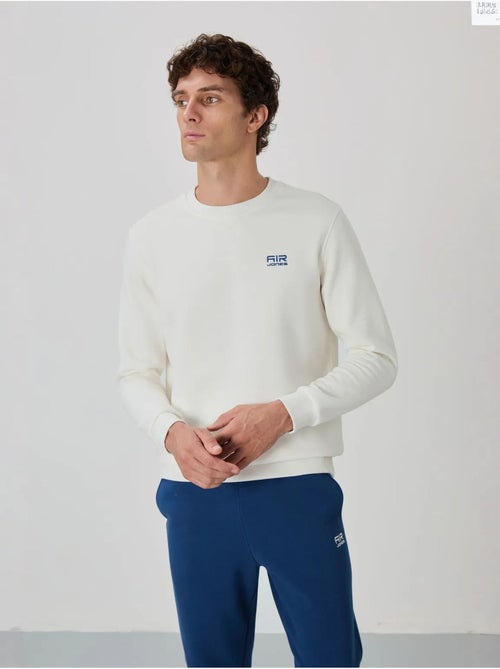 Set da uomo di felpa in pile di cotone e poliestere con sweatshirt e pantaloni tommy - Kiabi Set da uomo di felpa in pile di cotone e poliestere con sweatshirt e pantaloni tommy - Kiabi