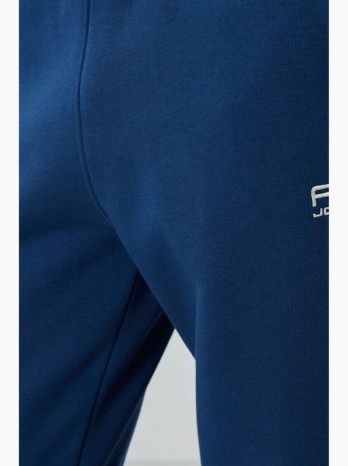 Set da uomo di felpa in pile di cotone e poliestere con sweatshirt e pantaloni tommy - Kiabi Set da uomo di felpa in pile di cotone e poliestere con sweatshirt e pantaloni tommy - Kiabi