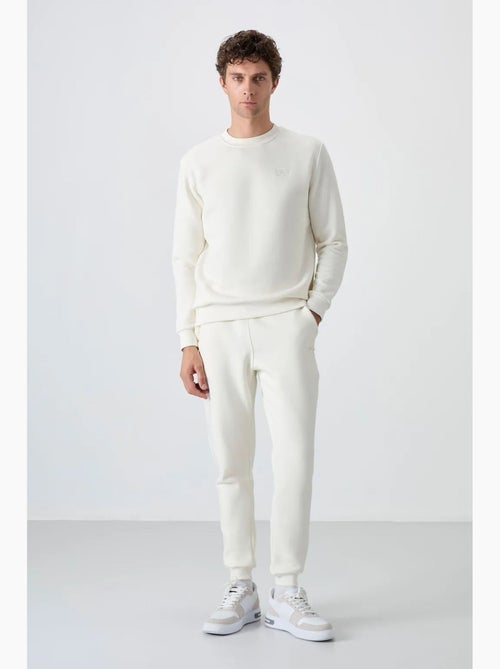 Set da uomo di felpa in pile di cotone e poliestere con sweatshirt e pantaloni tommy - Kiabi Set da uomo di felpa in pile di cotone e poliestere con sweatshirt e pantaloni tommy - Kiabi